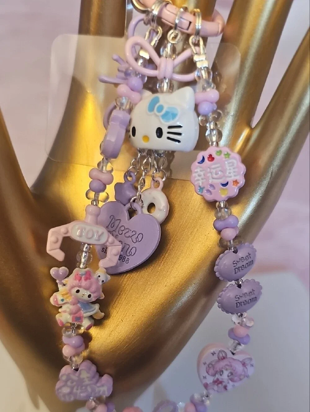 CHARMS: Sanrio Hello Kitty Lilac and Pink Phone Charm - Picture 3 of 3